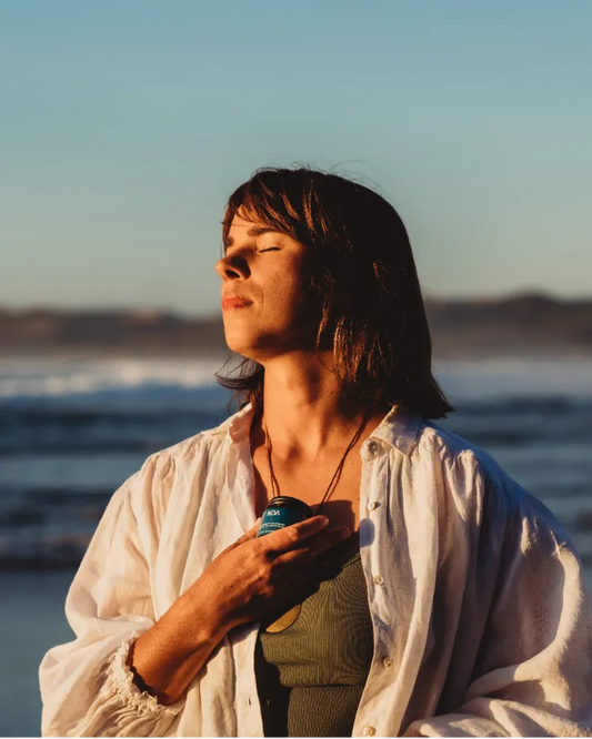 Woman Using Koa Botanics Magnesium