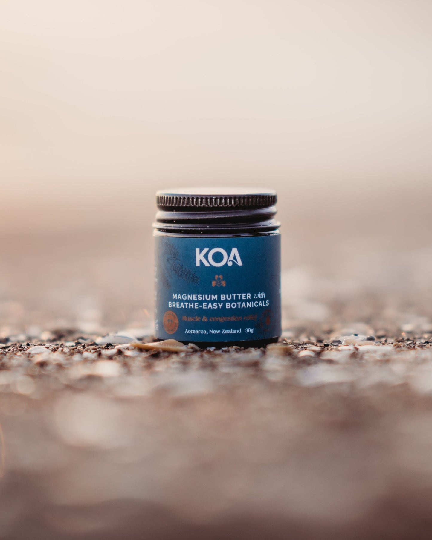 Magnesium with Breath Easy Botanicals on the beach with shells