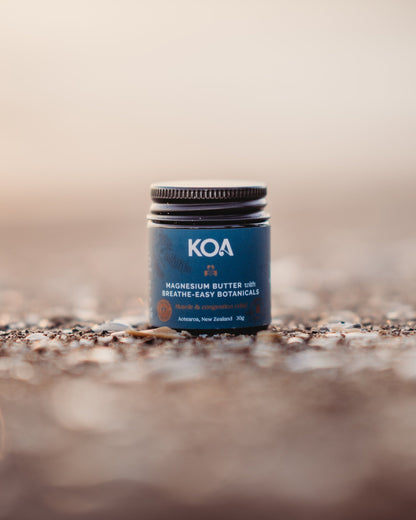 Magnesium with Breath Easy Botanicals on the beach with shells